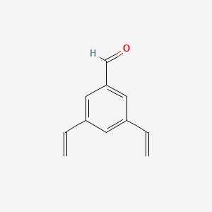 B598096 3,5-Divinylbenzaldehyde CAS No. 195967-44-3