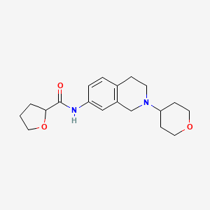 N-[2-(oxan-4-yl)-3,4-dihydro-1H-isoquinolin-7-yl]oxolane-2-carboxamide