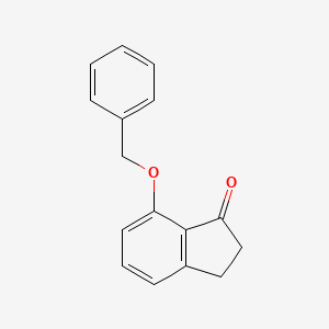 B598750 7-(Benzyloxy)-2,3-dihydro-1H-inden-1-one CAS No. 125494-84-0