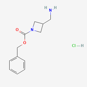 molecular formula C12H17ClN2O2 B598904 苯甲酸苄酯 3-(氨甲基)氮杂环丁-1-羧酸盐盐酸盐 CAS No. 1203086-10-5