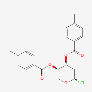 B601083 [(2S,4S,5R)-2-Chloro-5-(4-methylbenzoyl)oxyoxan-4-yl] 4-methylbenzoate CAS No. 20535-28-8