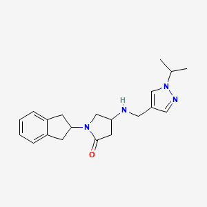 molecular formula C20H26N4O B6028489 1-(2,3-dihydro-1H-inden-2-yl)-4-{[(1-isopropyl-1H-pyrazol-4-yl)methyl]amino}-2-pyrrolidinone 