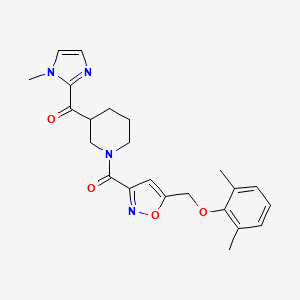 molecular formula C23H26N4O4 B6043872 [1-({5-[(2,6-dimethylphenoxy)methyl]-3-isoxazolyl}carbonyl)-3-piperidinyl](1-methyl-1H-imidazol-2-yl)methanone 