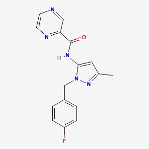 molecular formula C16H14FN5O B6051085 N-[1-(4-fluorobenzyl)-3-methyl-1H-pyrazol-5-yl]pyrazine-2-carboxamide 