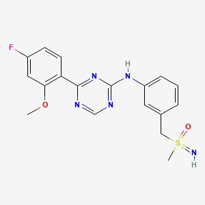 molecular formula C18H18FN5O2S B605681 4-(4-fluoro-2-methoxyphenyl)-N-(3-((S-methylsulfonimidoyl)methyl)phenyl)-1,3,5-triazin-2-amine CAS No. 1414943-88-6