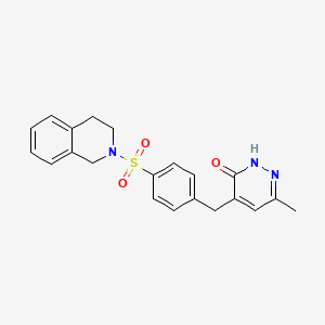 molecular formula C21H21N3O3S B6059998 4-[4-(3,4-dihydro-2(1H)-isoquinolinylsulfonyl)benzyl]-6-methyl-3(2H)-pyridazinone 