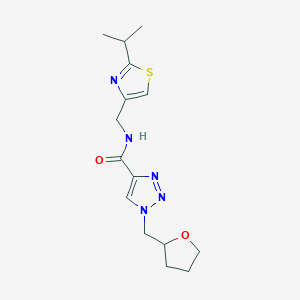 molecular formula C15H21N5O2S B6062613 N-[(2-isopropyl-1,3-thiazol-4-yl)methyl]-1-(tetrahydro-2-furanylmethyl)-1H-1,2,3-triazole-4-carboxamide 