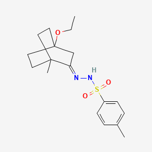 molecular formula C18H26N2O3S B6065612 N-[(E)-(4-ethoxy-1-methyl-2-bicyclo[2.2.2]octanylidene)amino]-4-methylbenzenesulfonamide 