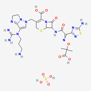 molecular formula C25H35N13O11S3 B607548 3-[[7-[3-Aminopropyl(carbamimidoyl)amino]-2,3-dihydroimidazo[1,2-b]pyrazol-5-yl]methyl]-7-[[2-(5-amino-1,2,4-thiadiazol-3-yl)-2-(2-carboxypropan-2-yloxyimino)acetyl]amino]-8-oxo-5-thia-1-azabicyclo[4.2.0]oct-2-ene-2-carboxylic acid;sulfuric acid CAS No. 1019207-72-7