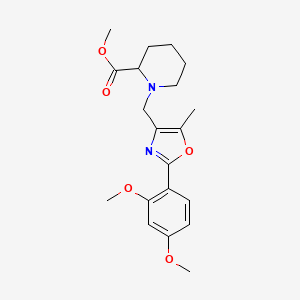 molecular formula C20H26N2O5 B6086517 methyl 1-{[2-(2,4-dimethoxyphenyl)-5-methyl-1,3-oxazol-4-yl]methyl}-2-piperidinecarboxylate 