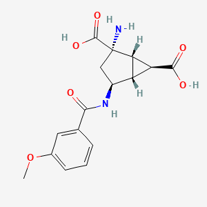 molecular formula C16H18N2O6 B608717 (1S,2S,4S,5R,6S)-2-amino-4-[(3-methoxybenzene-1-carbonyl)amino]bicyclo[3.1.0]hexane-2,6-dicarboxylic acid CAS No. 2173037-97-1