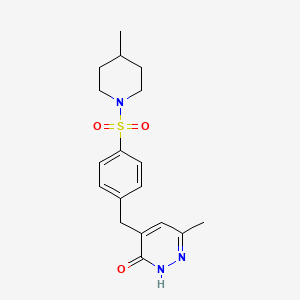molecular formula C18H23N3O3S B6089072 6-methyl-4-{4-[(4-methyl-1-piperidinyl)sulfonyl]benzyl}-3(2H)-pyridazinone 