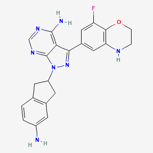 molecular formula C22H20FN7O B608953 1-(5-amino-2,3-dihydro-1H-inden-2-yl)-3-(8-fluoro-3,4-dihydro-2H-1,4-benzoxazin-6-yl)pyrazolo[3,4-d]pyrimidin-4-amine CAS No. 2058116-52-0
