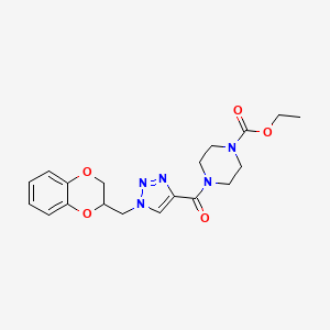 molecular formula C19H23N5O5 B6089858 ethyl 4-{[1-(2,3-dihydro-1,4-benzodioxin-2-ylmethyl)-1H-1,2,3-triazol-4-yl]carbonyl}-1-piperazinecarboxylate 