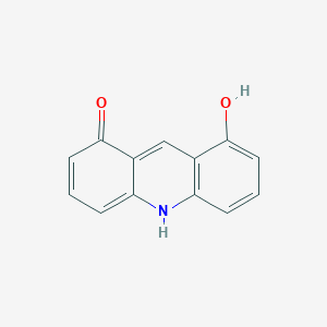 molecular formula C13H9NO2 B060964 8-Hydroxyacridin-1(10H)-one CAS No. 191915-75-0