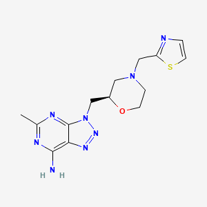 molecular formula C14H18N8OS B609932 5-甲基-3-[[(2R)-4-(1,3-噻唑-2-基甲基)吗啉-2-基]甲基]三唑并[4,5-d]嘧啶-7-胺 CAS No. 1305116-69-1
