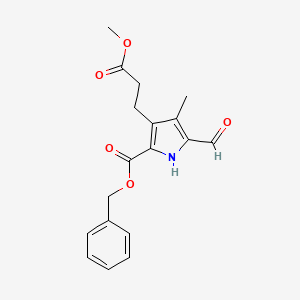 molecular formula C18H19NO5 B610350 5-甲酰基-3-(3-甲氧基-3-氧代丙基)-4-甲基-1H-吡咯-2-甲酸苄酯 CAS No. 62618-53-5