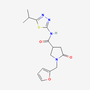 molecular formula C15H18N4O3S B6113951 1-(2-furylmethyl)-N-(5-isopropyl-1,3,4-thiadiazol-2-yl)-5-oxo-3-pyrrolidinecarboxamide 