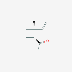 molecular formula C9H14O B061289 1-[(1R,2S)-2-Ethenyl-2-methylcyclobutyl]ethanone CAS No. 173829-77-1