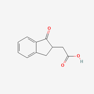 2-(1-oxo-2,3-dihydro-1H-inden-2-yl)acetic acid