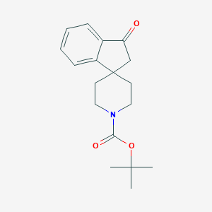 molecular formula C18H23NO3 B061706 叔丁基 3-氧代-2,3-二氢螺[茚满-1,4'-哌啶]-1'-甲酸酯 CAS No. 159634-59-0