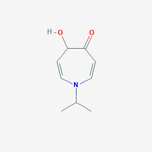 molecular formula C9H13NO2 B062774 4-Hydroxy-1-propan-2-yl-4H-azepin-5-one CAS No. 162712-65-4