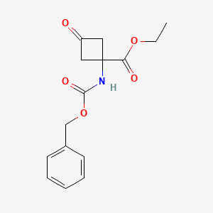 molecular formula C15H17NO5 B6286679 Ethyl 1-(benzyloxycarbonylamino)-3-oxo-cyclobutanecarboxylate CAS No. 2306274-66-6
