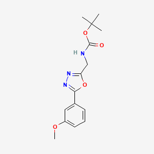 molecular formula C15H19N3O4 B6299056 [5-(3-Methoxy-phenyl)-[1,3,4]oxadiazol-2-ylmethyl]-carbamic acid tert-butyl ester CAS No. 2368871-15-0