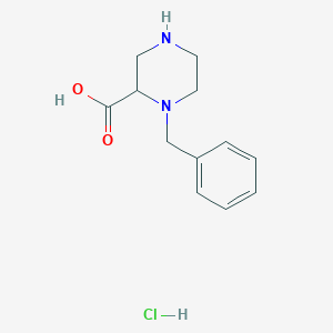 molecular formula C12H17ClN2O2 B6308426 1-Benzylpiperazine-2-carboxylic acid HCl CAS No. 2308061-25-6