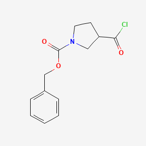 molecular formula C13H14ClNO3 B6314688 Benzyl 3-(chlorocarbonyl)pyrrolidine-1-carboxylate CAS No. 1823237-17-7