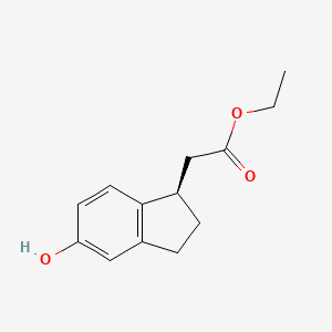 molecular formula C13H16O3 B6324645 Ethyl 2-[(1R)-5-hydroxy-2,3-dihydro-1H-inden-1-yl]acetate CAS No. 1234845-27-2