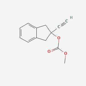 molecular formula C13H12O3 B6343324 Carbonic acid 2-ethynyl-indan-2-yl ester methyl ester CAS No. 1029773-30-5