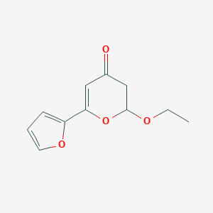 molecular formula C11H12O4 B063511 2-Ethoxy-6-(furan-2-yl)-2H-pyran-4(3H)-one CAS No. 186134-93-0