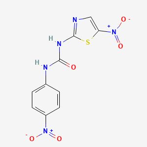 molecular formula C10H7N5O5S B6353328 1-(4-Nitro-phenyl)-3-(5-nitro-thiazol-2-yl)-urea CAS No. 99073-69-5