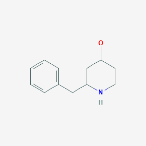 molecular formula C12H15NO B063602 2-Benzylpiperidin-4-one CAS No. 193469-44-2