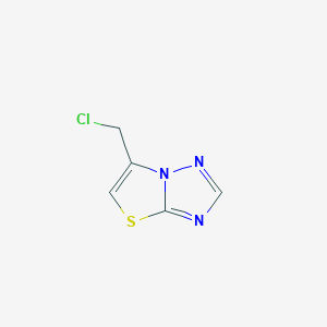 molecular formula C5H4ClN3S B064072 6-(Chloromethyl)-[1,3]thiazolo[3,2-b][1,2,4]triazole CAS No. 170658-31-8