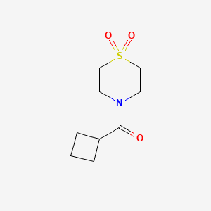 molecular formula C9H15NO3S B6423886 4-cyclobutanecarbonyl-1lambda6-thiomorpholine-1,1-dione CAS No. 1790385-07-7