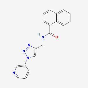 molecular formula C19H15N5O B6424979 N-{[1-(pyridin-3-yl)-1H-1,2,3-triazol-4-yl]methyl}naphthalene-1-carboxamide CAS No. 2034311-88-9