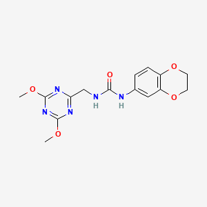 molecular formula C15H17N5O5 B6425222 1-(2,3-dihydro-1,4-benzodioxin-6-yl)-3-[(4,6-dimethoxy-1,3,5-triazin-2-yl)methyl]urea CAS No. 2034356-81-3