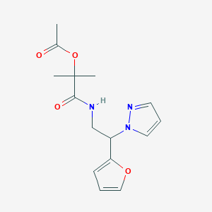 molecular formula C15H19N3O4 B6425535 1-{[2-(furan-2-yl)-2-(1H-pyrazol-1-yl)ethyl]carbamoyl}-1-methylethyl acetate CAS No. 2034544-88-0
