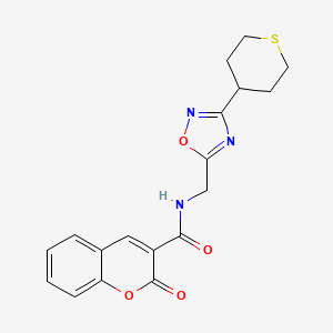 2-oxo-N-{[3-(thian-4-yl)-1,2,4-oxadiazol-5-yl]methyl}-2H-chromene-3-carboxamide