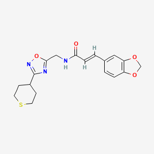 (2E)-3-(2H-1,3-benzodioxol-5-yl)-N-{[3-(thian-4-yl)-1,2,4-oxadiazol-5-yl]methyl}prop-2-enamide