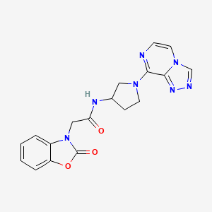 molecular formula C18H17N7O3 B6425906 2-(2-oxo-2,3-dihydro-1,3-benzoxazol-3-yl)-N-(1-{[1,2,4]triazolo[4,3-a]pyrazin-8-yl}pyrrolidin-3-yl)acetamide CAS No. 2034382-78-8