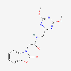 molecular formula C15H15N5O5 B6426539 N-[(4,6-dimethoxy-1,3,5-triazin-2-yl)methyl]-2-(2-oxo-2,3-dihydro-1,3-benzoxazol-3-yl)acetamide CAS No. 2034411-22-6