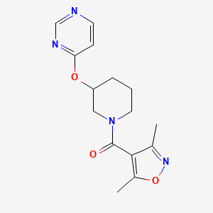 molecular formula C15H18N4O3 B6427410 4-{[1-(3,5-dimethyl-1,2-oxazole-4-carbonyl)piperidin-3-yl]oxy}pyrimidine CAS No. 2034523-91-4