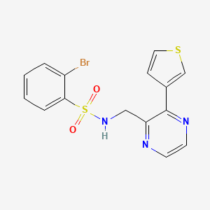 2-bromo-N-{[3-(thiophen-3-yl)pyrazin-2-yl]methyl}benzene-1-sulfonamide