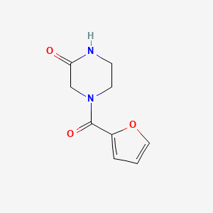 molecular formula C9H10N2O3 B6434169 4-(furan-2-carbonyl)piperazin-2-one CAS No. 91224-98-5