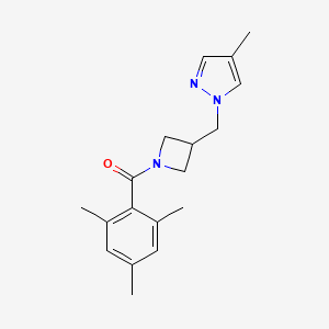 molecular formula C18H23N3O B6440466 4-methyl-1-{[1-(2,4,6-trimethylbenzoyl)azetidin-3-yl]methyl}-1H-pyrazole CAS No. 2549037-35-4
