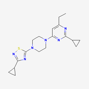 molecular formula C18H24N6S B6442310 2-cyclopropyl-4-[4-(3-cyclopropyl-1,2,4-thiadiazol-5-yl)piperazin-1-yl]-6-ethylpyrimidine CAS No. 2549045-21-6
