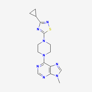 molecular formula C15H18N8S B6442634 6-[4-(3-cyclopropyl-1,2,4-thiadiazol-5-yl)piperazin-1-yl]-9-methyl-9H-purine CAS No. 2549051-61-6